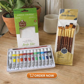 Beginner acrylic painting set including acrylic paint tubes and basic painting tools arranged together.