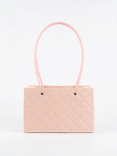 Quilted faux leather handbag with handles suitable for gifting and everyday use