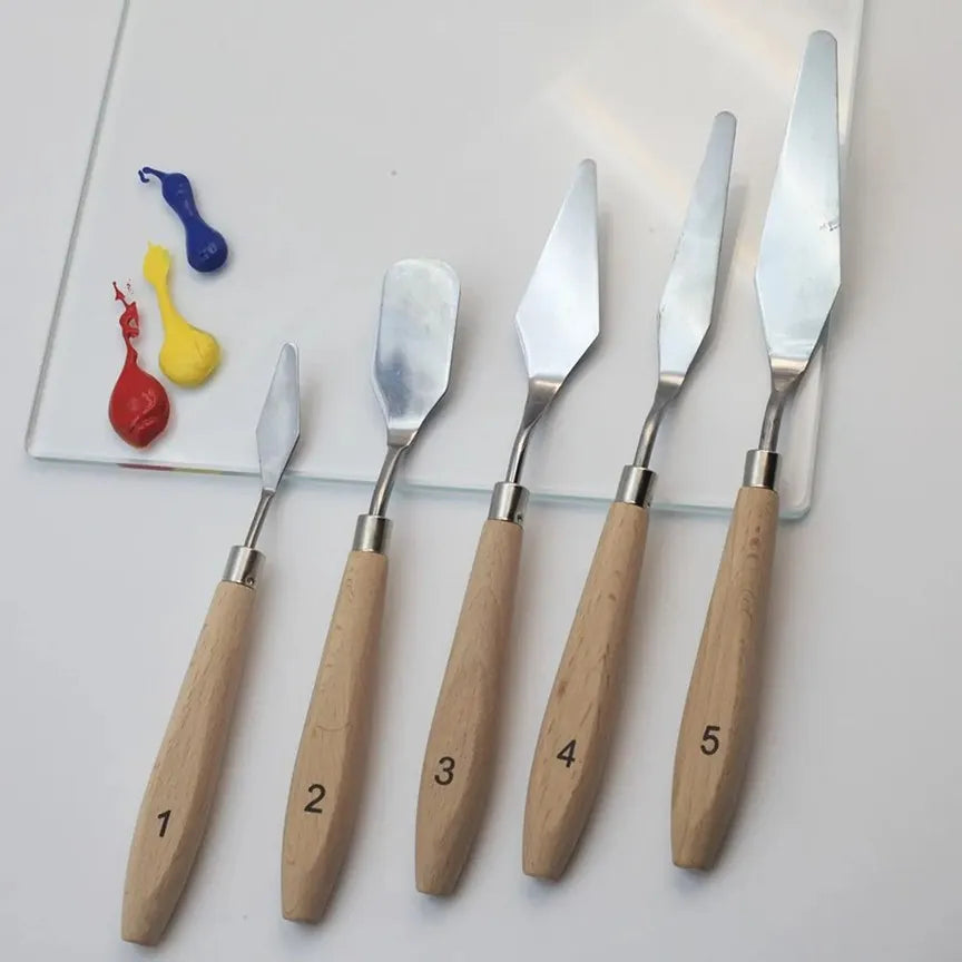 Vneeds 5-piece flexible stainless steel palette knife set with assorted blade shapes for acrylic painting, oil painting, texture art, and sculpting on a white background.