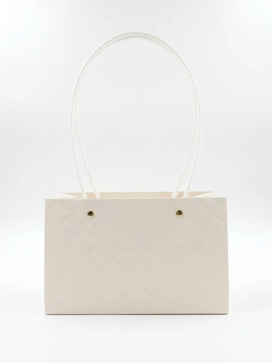 Quilted faux leather handbag with handles suitable for gifting and everyday use