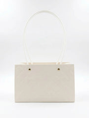 Quilted faux leather handbag with handles suitable for gifting and everyday use