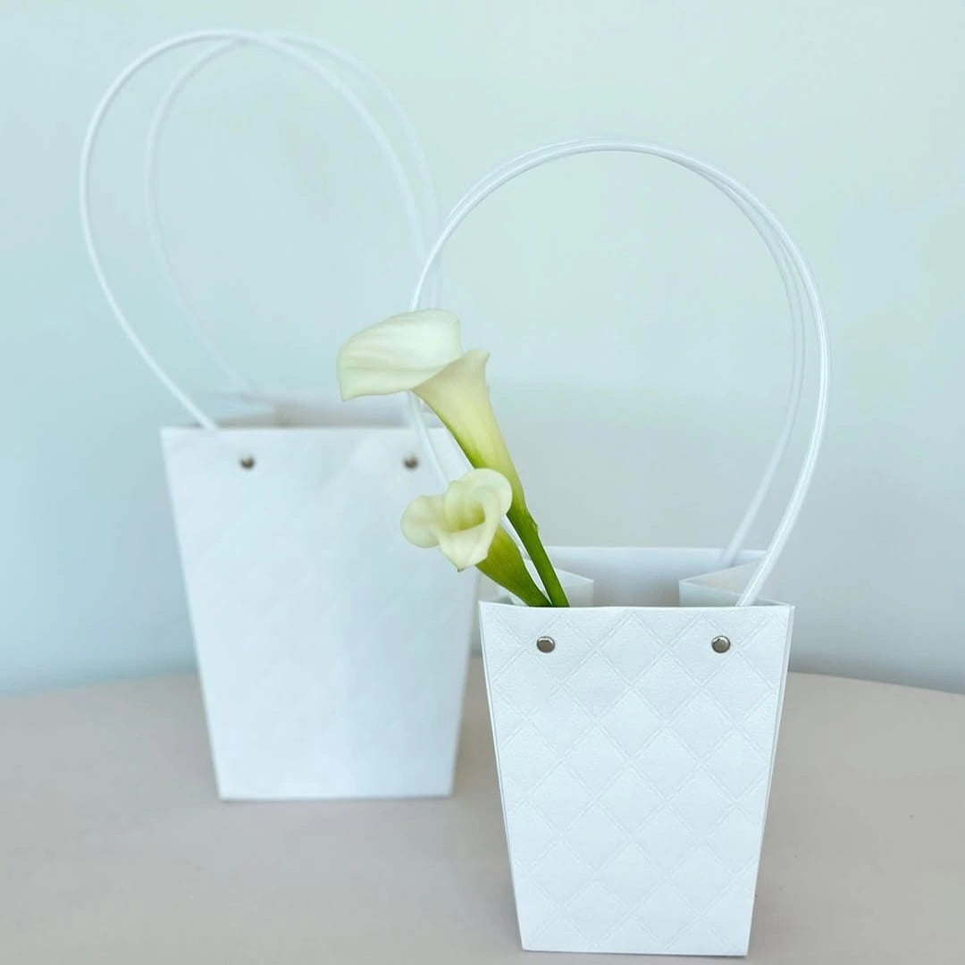 Mini quilted faux leather handbag with handles for everyday use and gifting